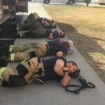 Man snaps heartbreaking photo of firefighters taking a rest after 24 hours of working nonstop